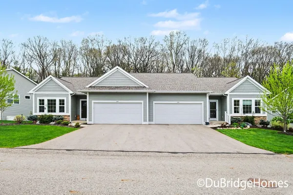 $475,000 | 69 Blue Violet Lane Northeast, Comstock Park, MI 49321