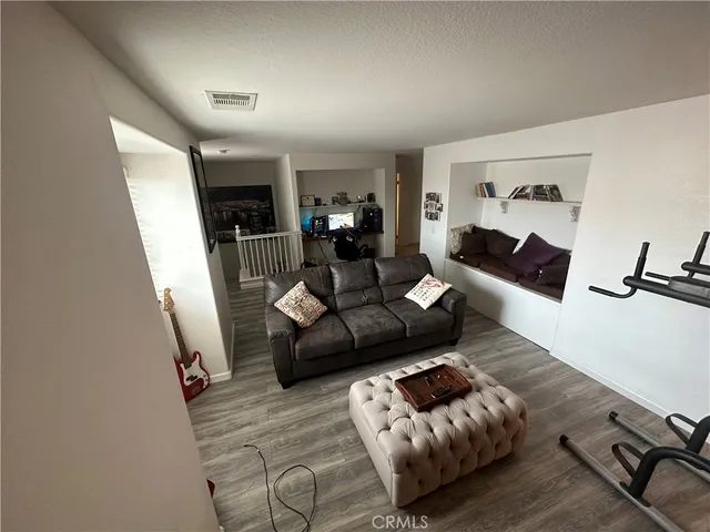 a living room with furniture and a couch