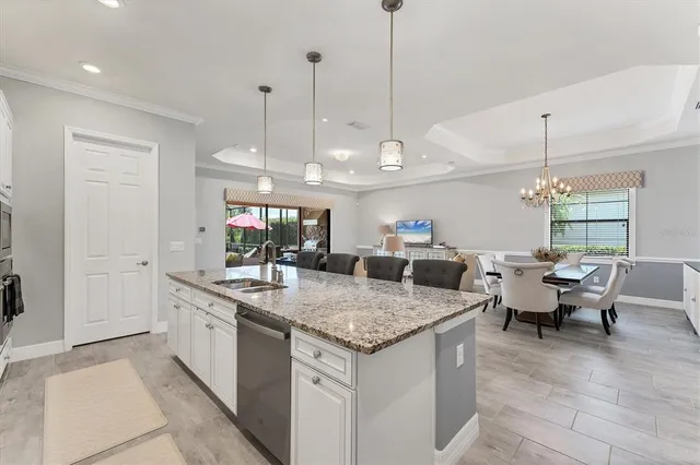 a bedroom with bed or furniture and a chandelier