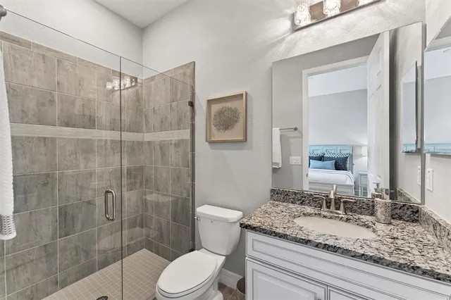 a view of a patio with a table and chairs