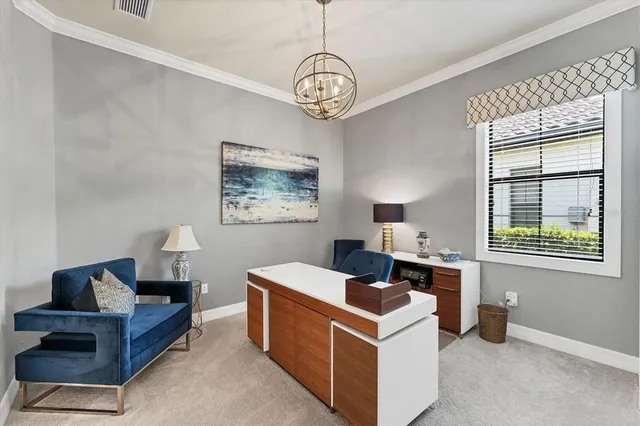 a front view of a house with a yard and a garage