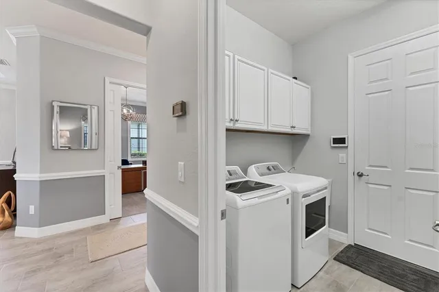 an aerial view of house with yard swimming pool and outdoor seating