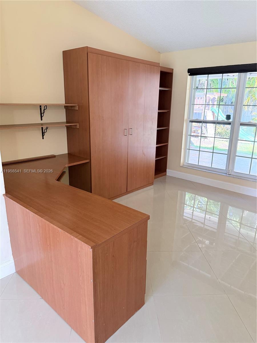 12821 Southwest 147th Lane Road Miami, FL 33186 - Photo 12 of 25 Office space w/ Murphy bed. Can be used for guests.
