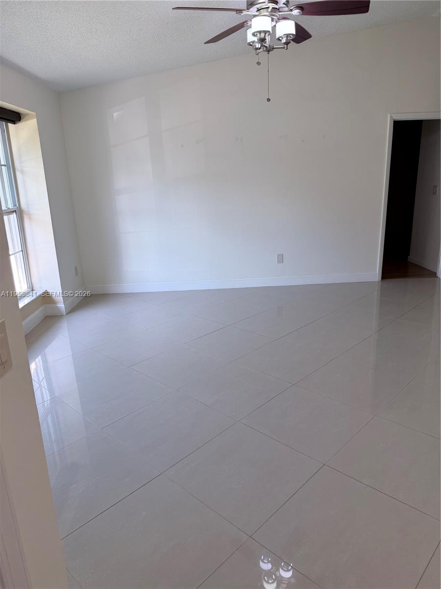 12821 Southwest 147th Lane Road Miami, FL 33186 - Photo 4 of 25 Very spacious living room