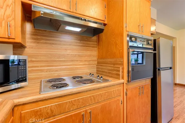 a view of a refrigerator in the kitchen