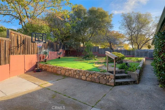 a view of a backyard with a garden