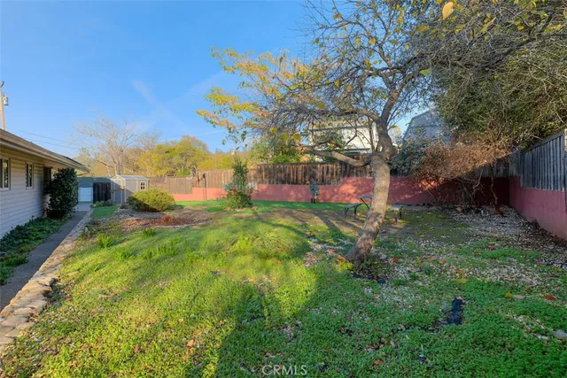 a backyard of a house with lots of green space