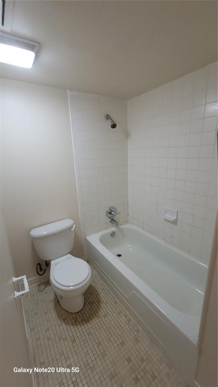 122 North Kings Avenue, Unit 202 Brandon, FL 33510 - Photo 12 of 12 a bathroom with a sink a toilet and bathtub