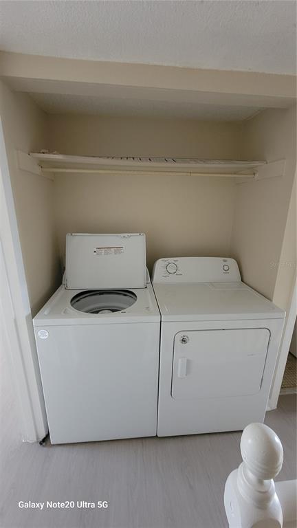 122 North Kings Avenue, Unit 202 Brandon, FL 33510 - Photo 7 of 12 a utility room with dryer and washer