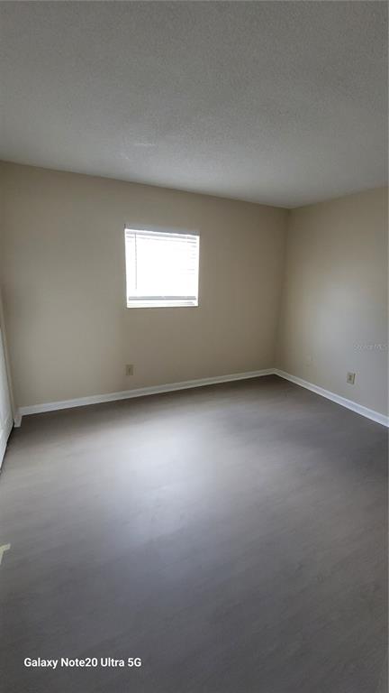 122 North Kings Avenue, Unit 202 Brandon, FL 33510 - Photo 8 of 12 an empty room with a window