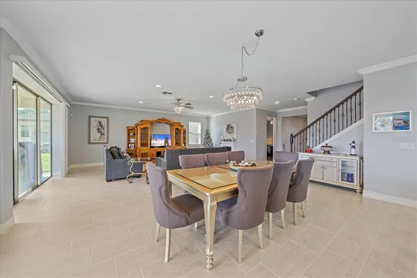 a view of a dining room with furniture window and outside view
