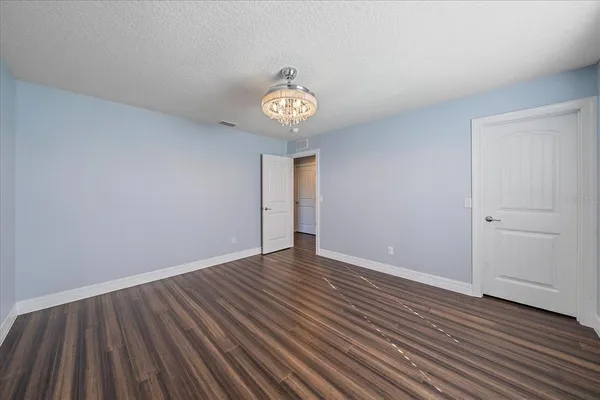 a bathroom with a bathtub and a toilet