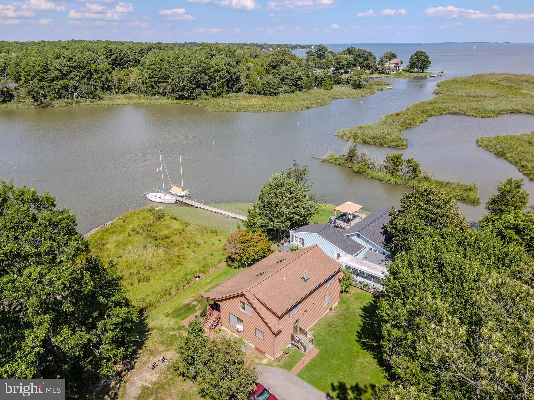968 Main Street Deale, MD 20751 - Photo 21 of 26 an aerial view of residential houses with outdoor space and lake view