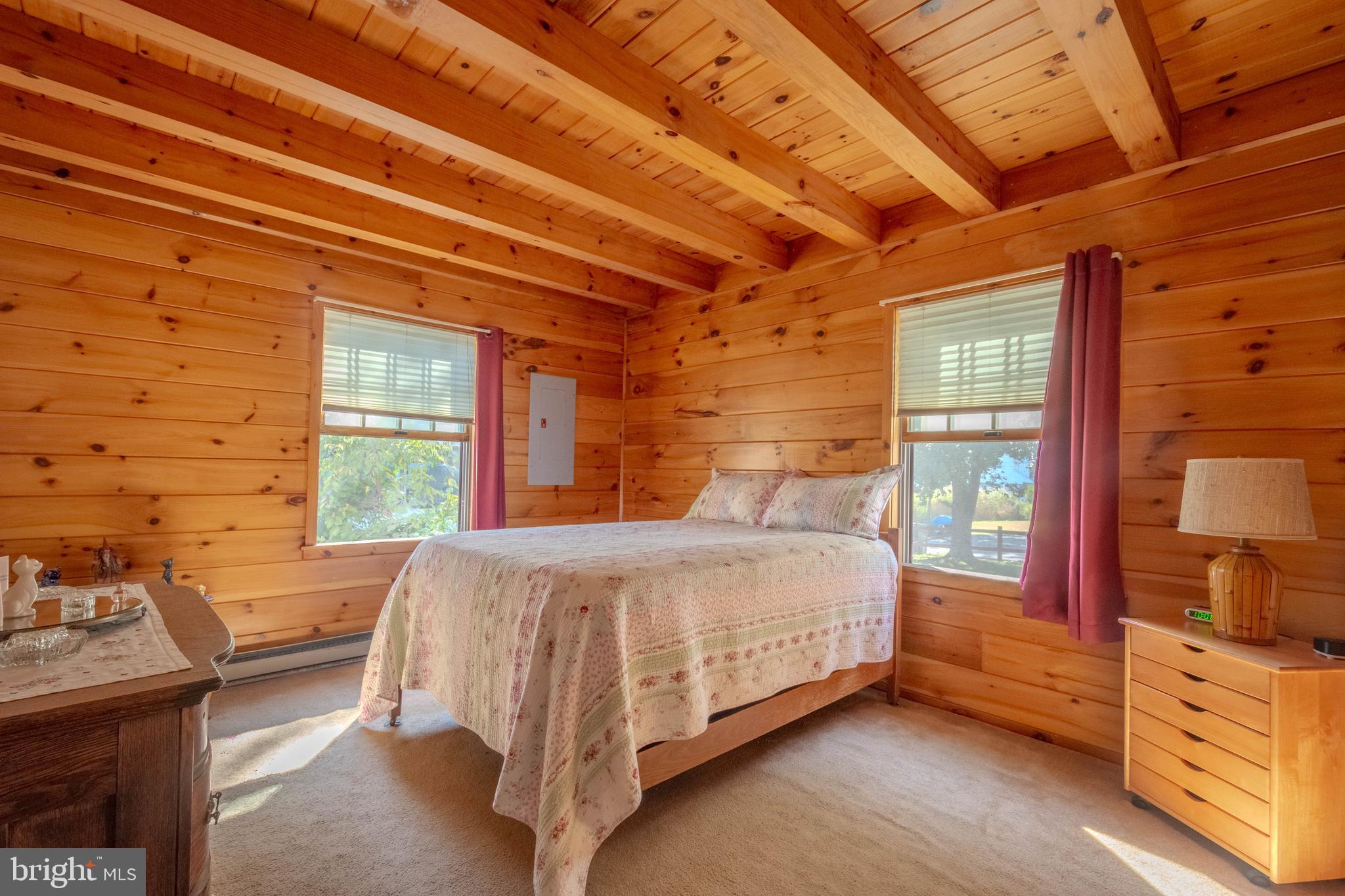 968 Main Street Deale, MD 20751 - Photo 26 of 26 a bed sitting in a bedroom next to a window