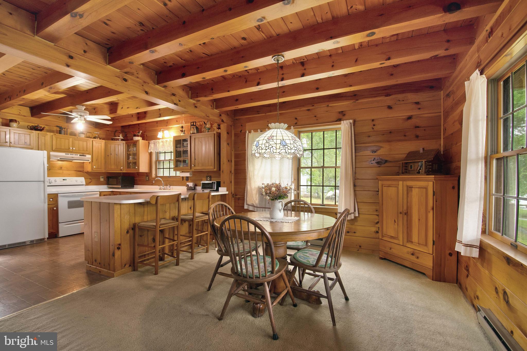 968 Main Street Deale, MD 20751 - Photo 9 of 26 a view of a dining room with furniture and window