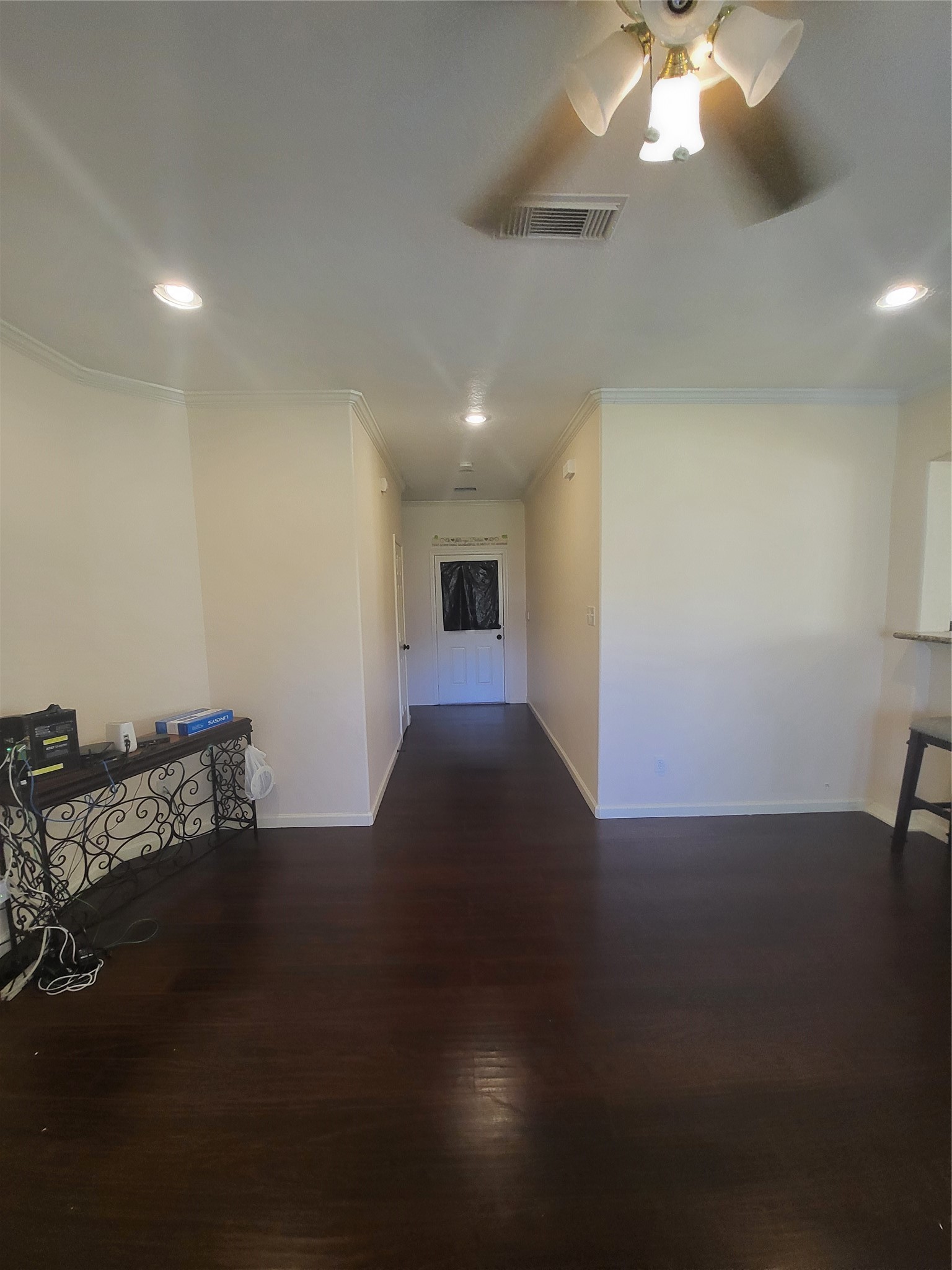 1904 Kansas Street La Marque, TX 77568 - Photo 8 of 20 a view of a room with furniture and wooden floor