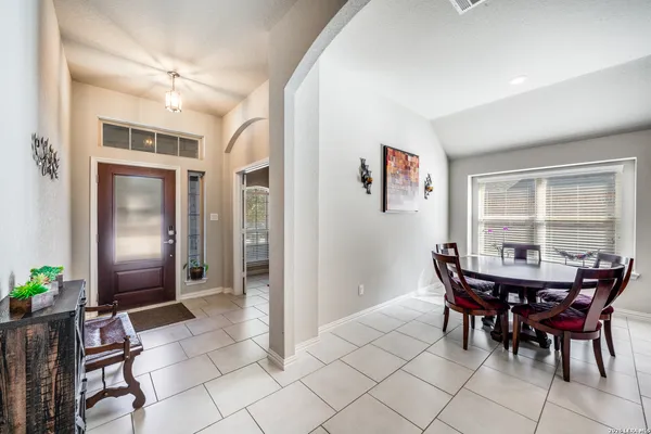 a view of a dining room with furniture