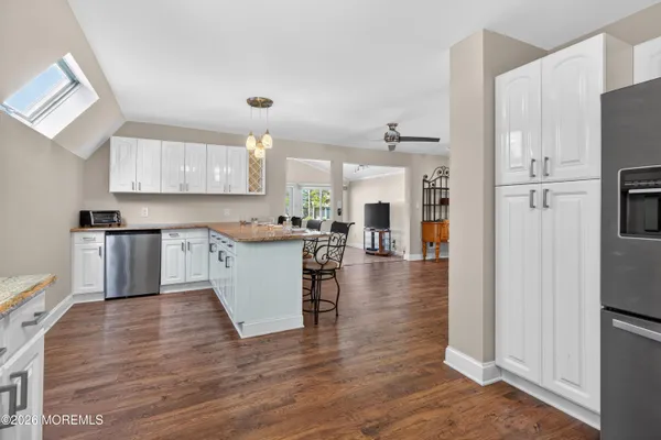 a view of a livingroom with furniture