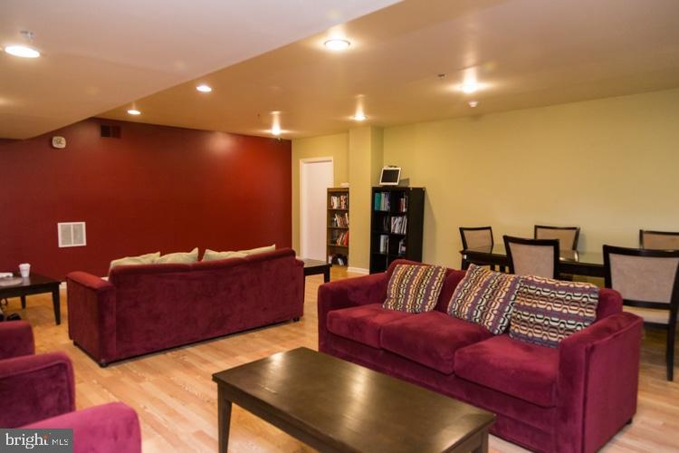 1324 Locust Street, Unit 317 Philadelphia, PA 19107 - Photo 11 of 12 a living room with furniture
