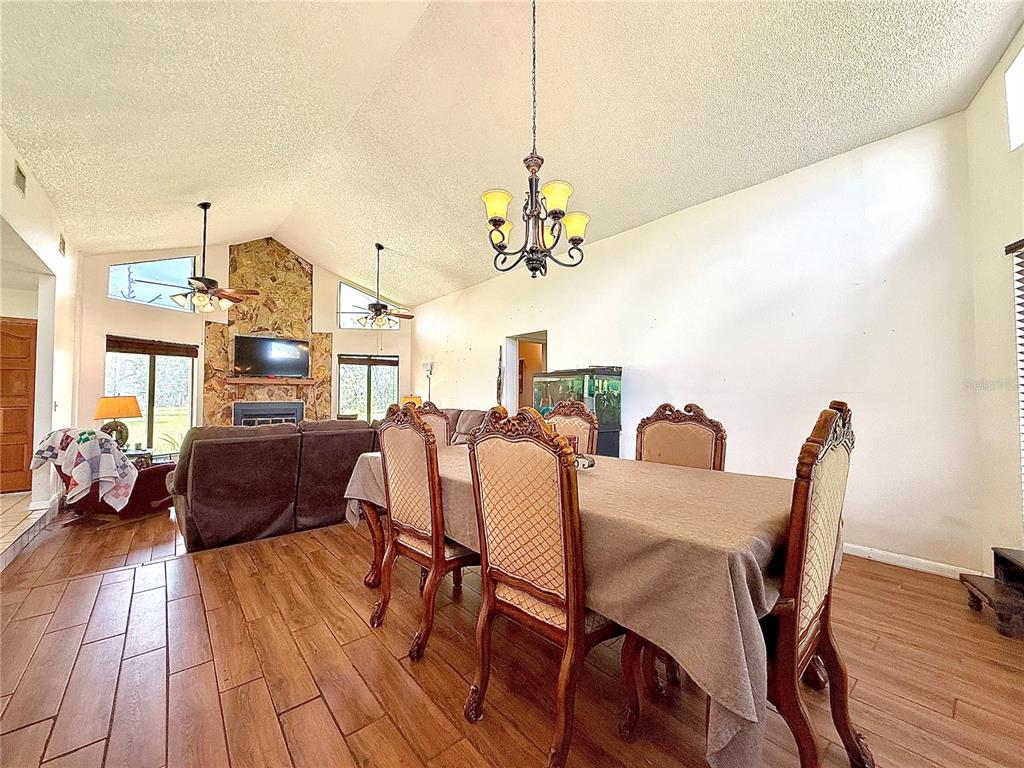2500 Brook Road North Fort Meade, FL 33841 - Photo 11 of 65 a dining room with furniture and wooden floor