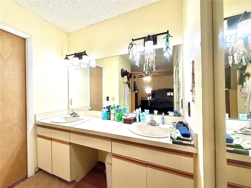 2500 Brook Road North Fort Meade, FL 33841 - Photo 35 of 65 a bathroom with a sink and a mirror