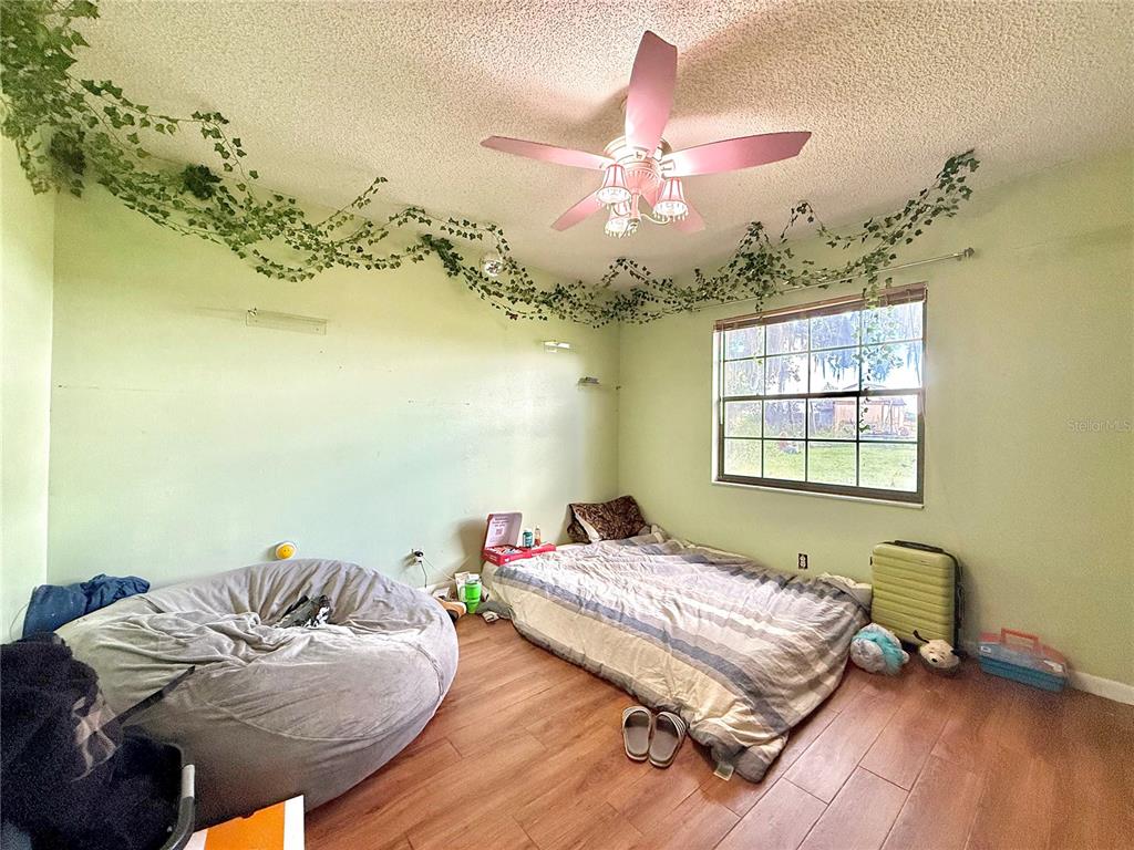 2500 Brook Road North Fort Meade, FL 33841 - Photo 42 of 65 a bedroom with a bed and window