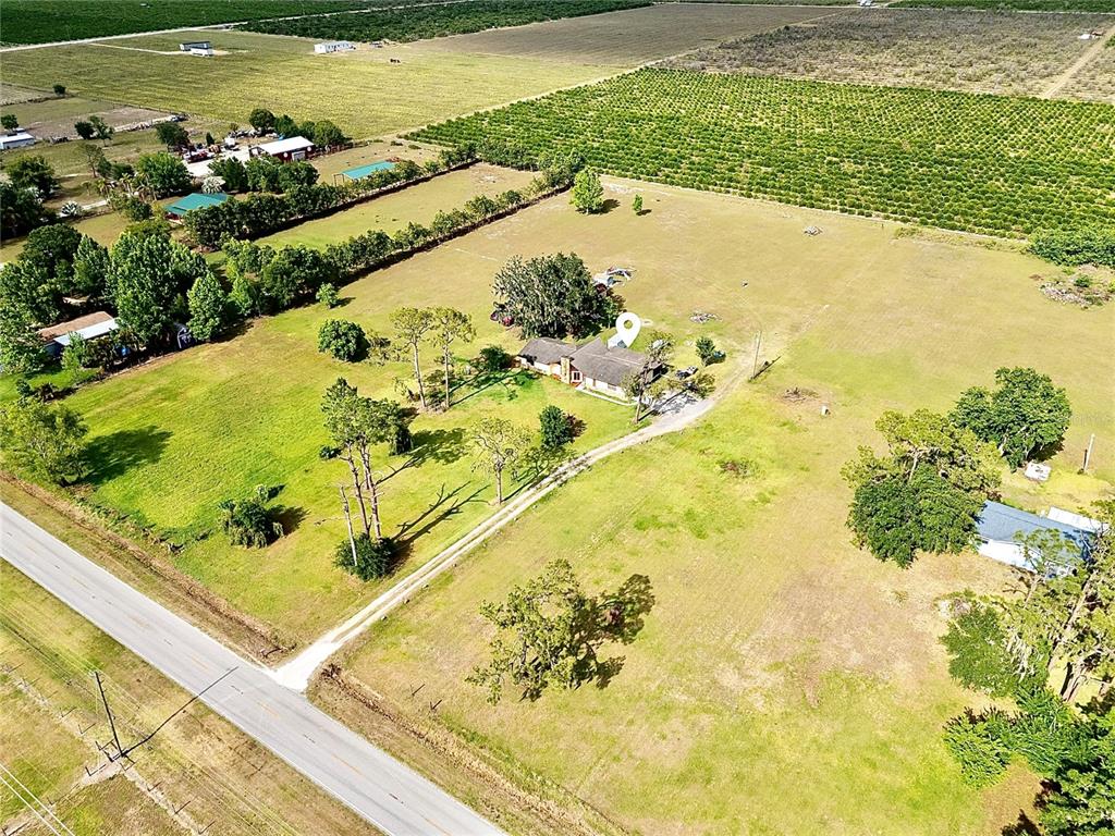 2500 Brook Road North Fort Meade, FL 33841 - Photo 60 of 65 a view of a swimming pool and an outdoor space