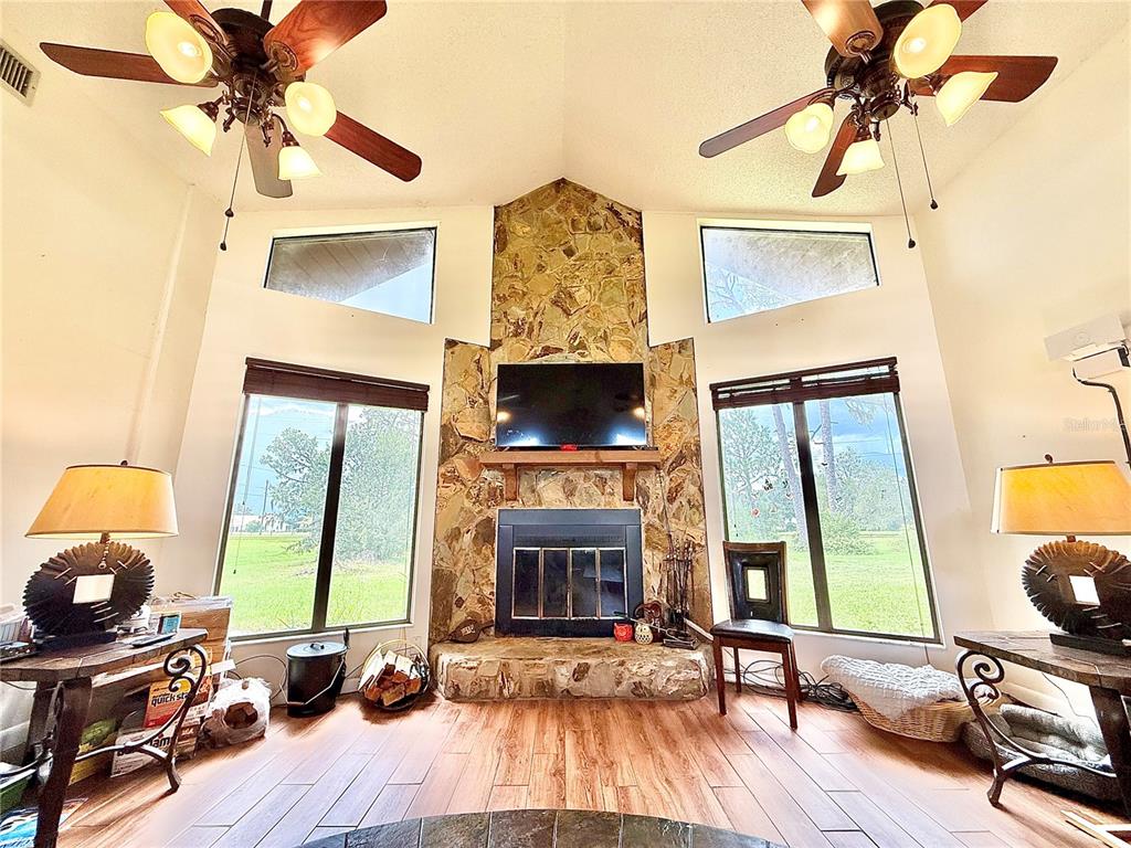 2500 Brook Road North Fort Meade, FL 33841 - Photo 8 of 65 a living room with furniture fireplace and flat screen tv