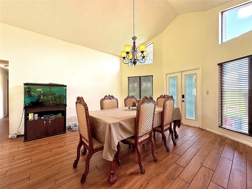 2500 Brook Road North Fort Meade, FL 33841 - Photo 9 of 65 a view of a a dining room with furniture window and wooden floor