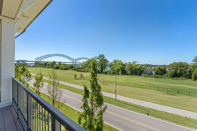 a view of a balcony with an outdoor space