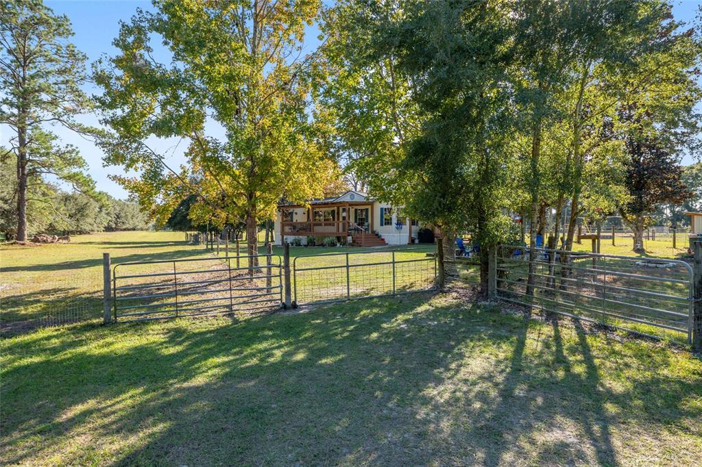 760 Southwest Barney Street High Springs, FL 32643 - Photo 2 of 57 a view of a park with large trees