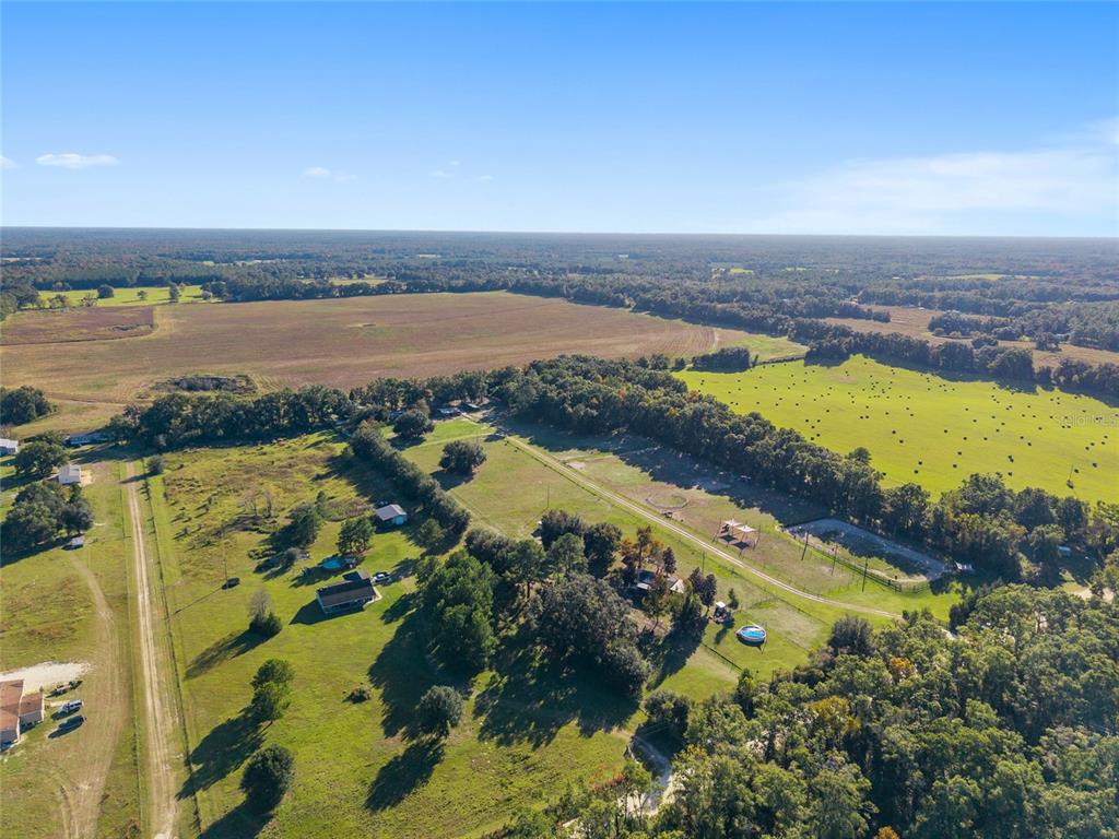 760 Southwest Barney Street High Springs, FL 32643 - Photo 46 of 57 an aerial view of ocean and residential houses with outdoor space