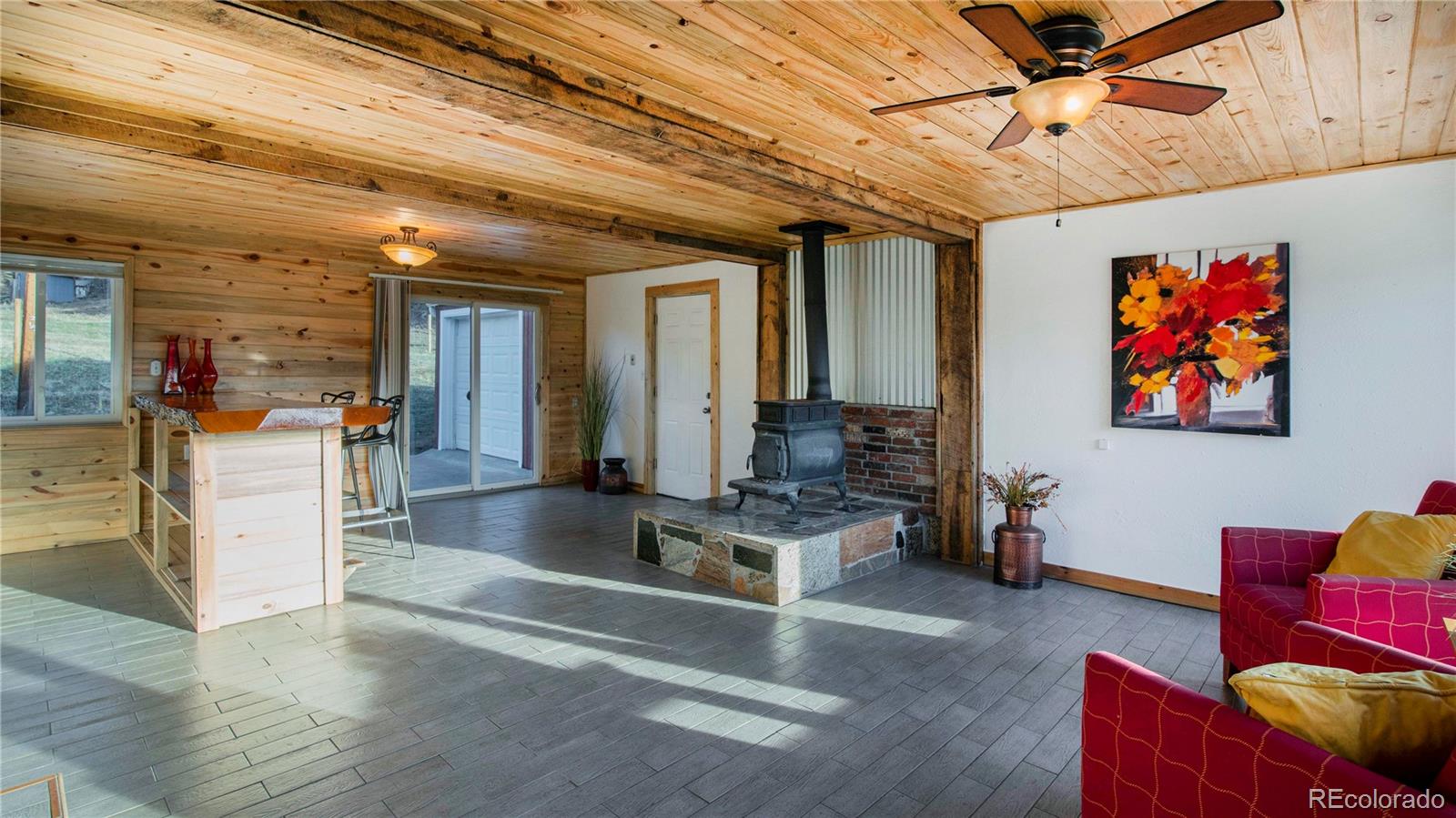 278 Jess-Mar Drive Shawnee, CO 80475 - Photo 22 of 40 a living room with furniture and wooden floor