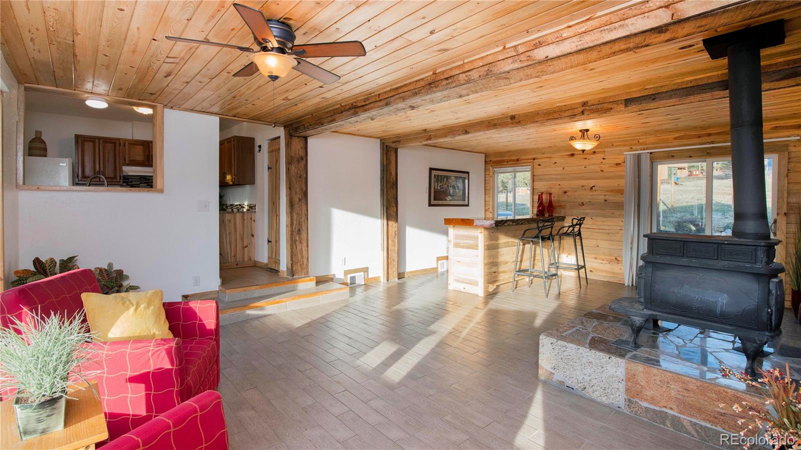 278 Jess-Mar Drive Shawnee, CO 80475 - Photo 25 of 40 a living room with furniture and wooden floors