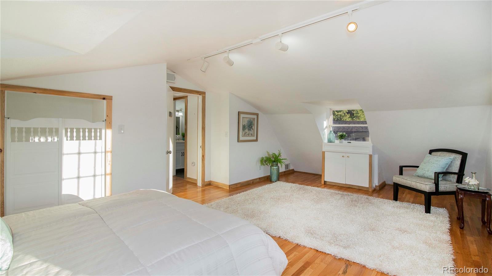 278 Jess-Mar Drive Shawnee, CO 80475 - Photo 28 of 40 a bedroom with a bed and a window