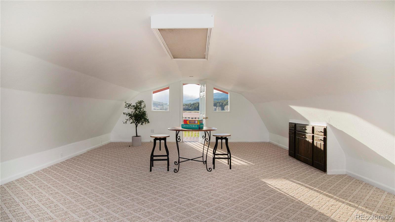 278 Jess-Mar Drive Shawnee, CO 80475 - Photo 35 of 40 a view of a livingroom with furniture and a window