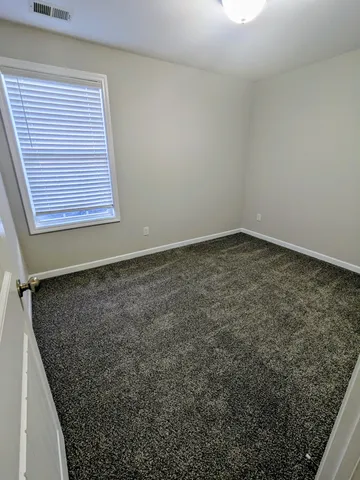 a view of a room with a window