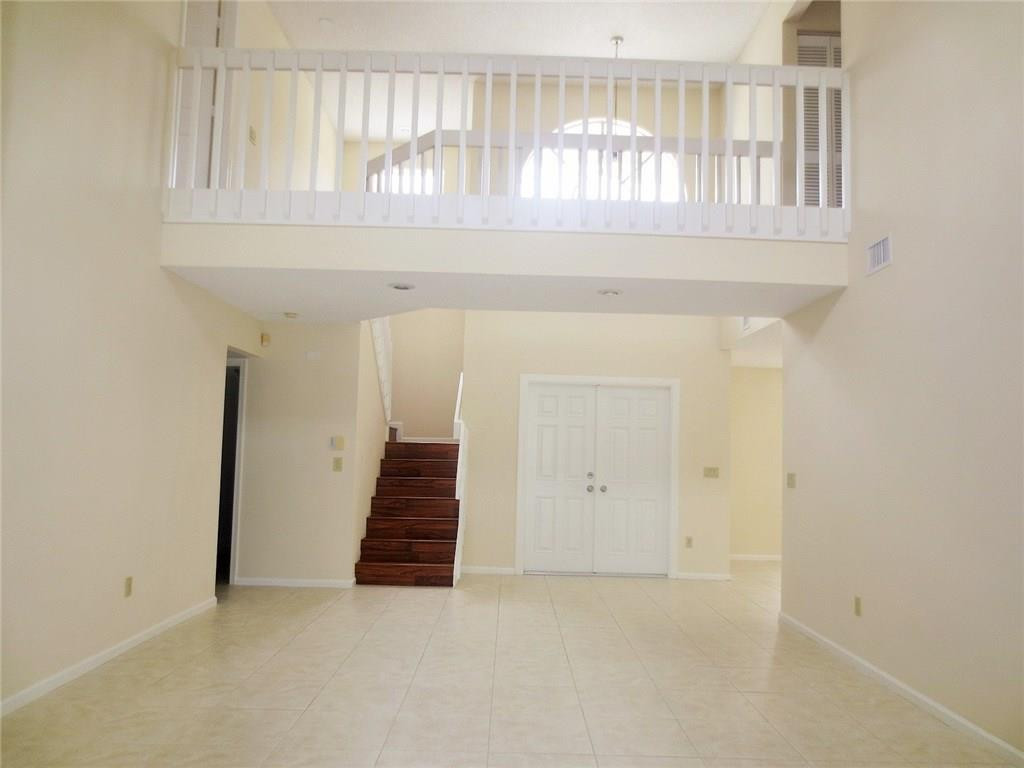 10544 Pebble Cove Lane Boca Raton, FL 33498 - Photo 2 of 25 Living Room and View of Cat Walk