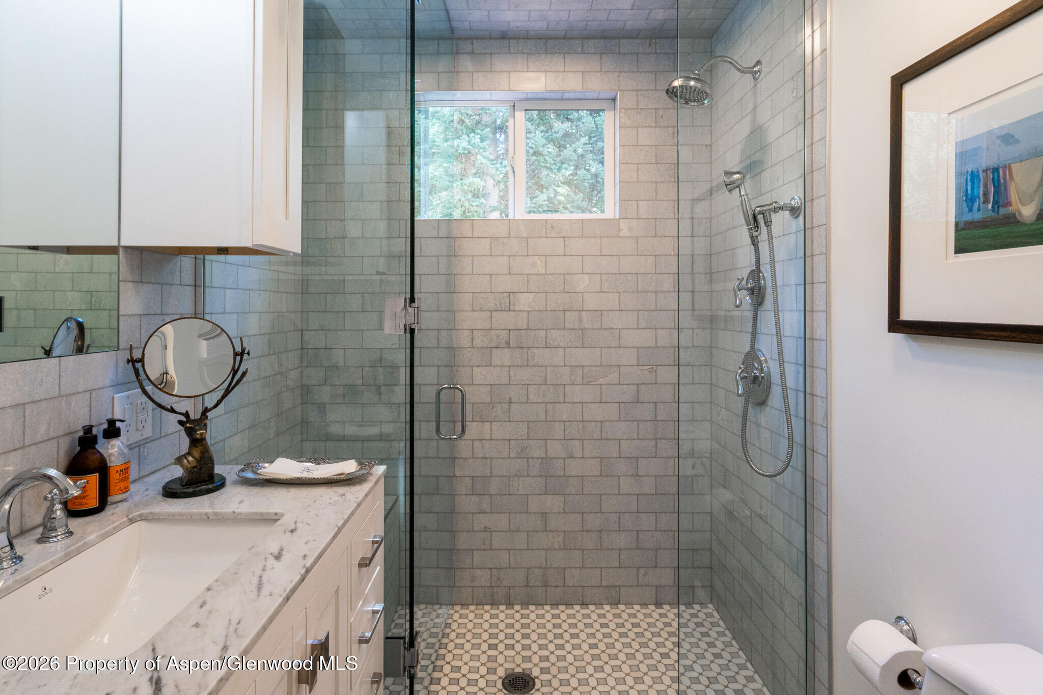 285 Conundrum Creek Road Aspen, CO 81611 - Photo 20 of 35 a bathroom with a sink toilet and shower