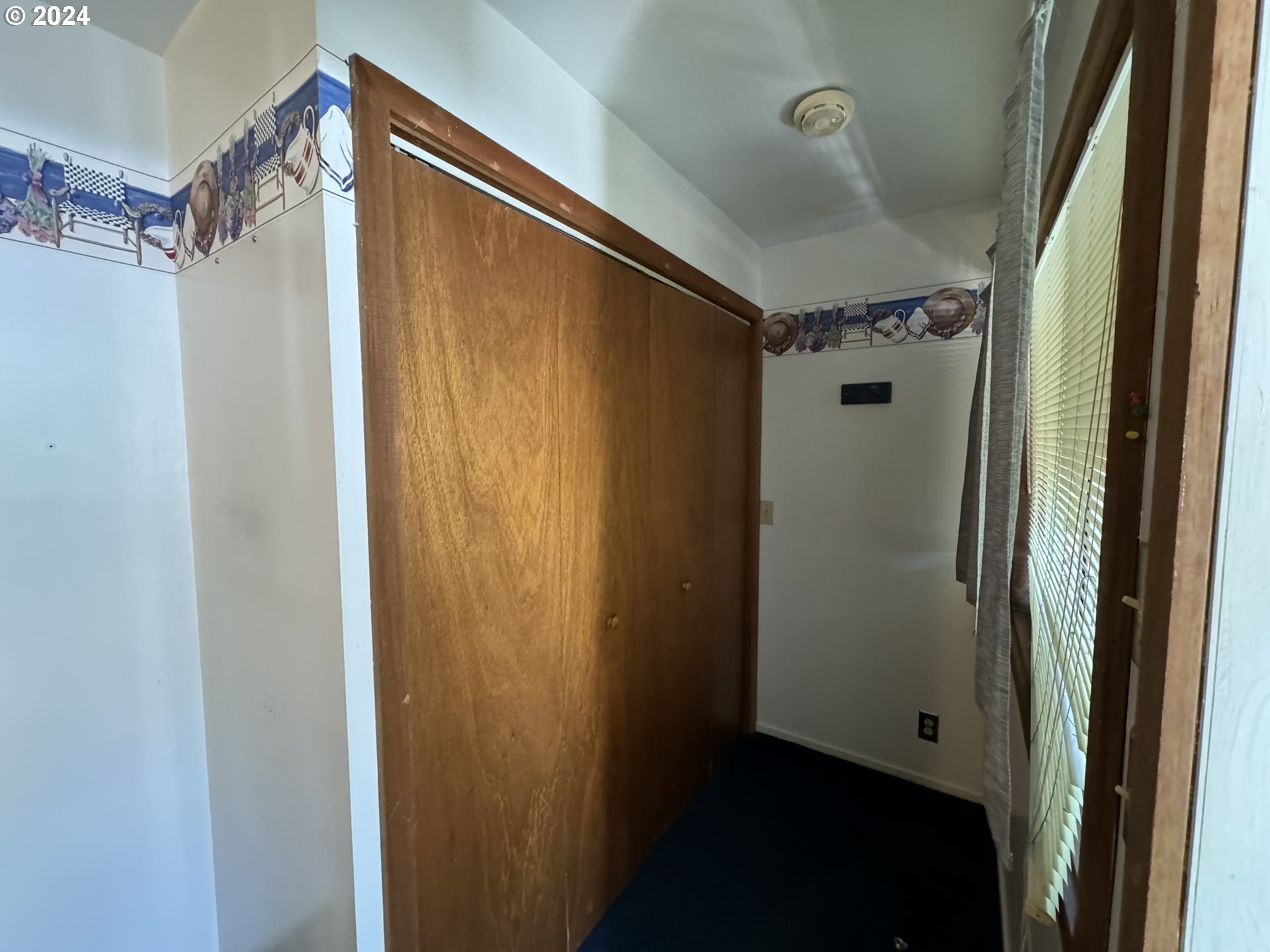 246 Horseshoe Bend Florence, OR 97439 - Photo 16 of 33 a bathroom with a shower and a mirror