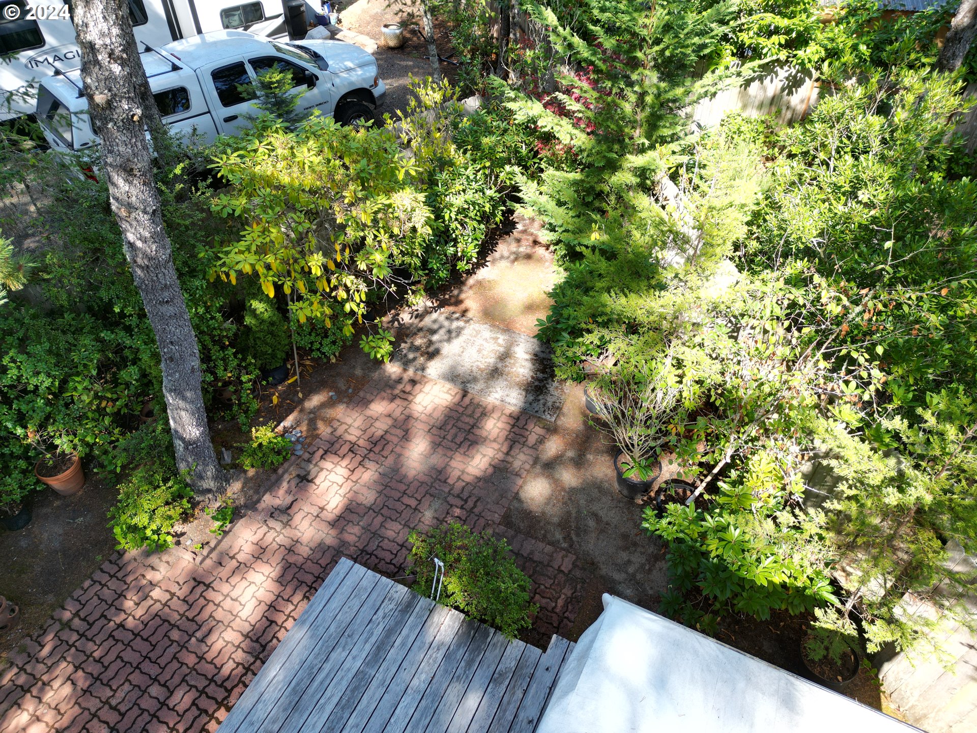 246 Horseshoe Bend Florence, OR 97439 - Photo 22 of 33 a view of a garden with plants