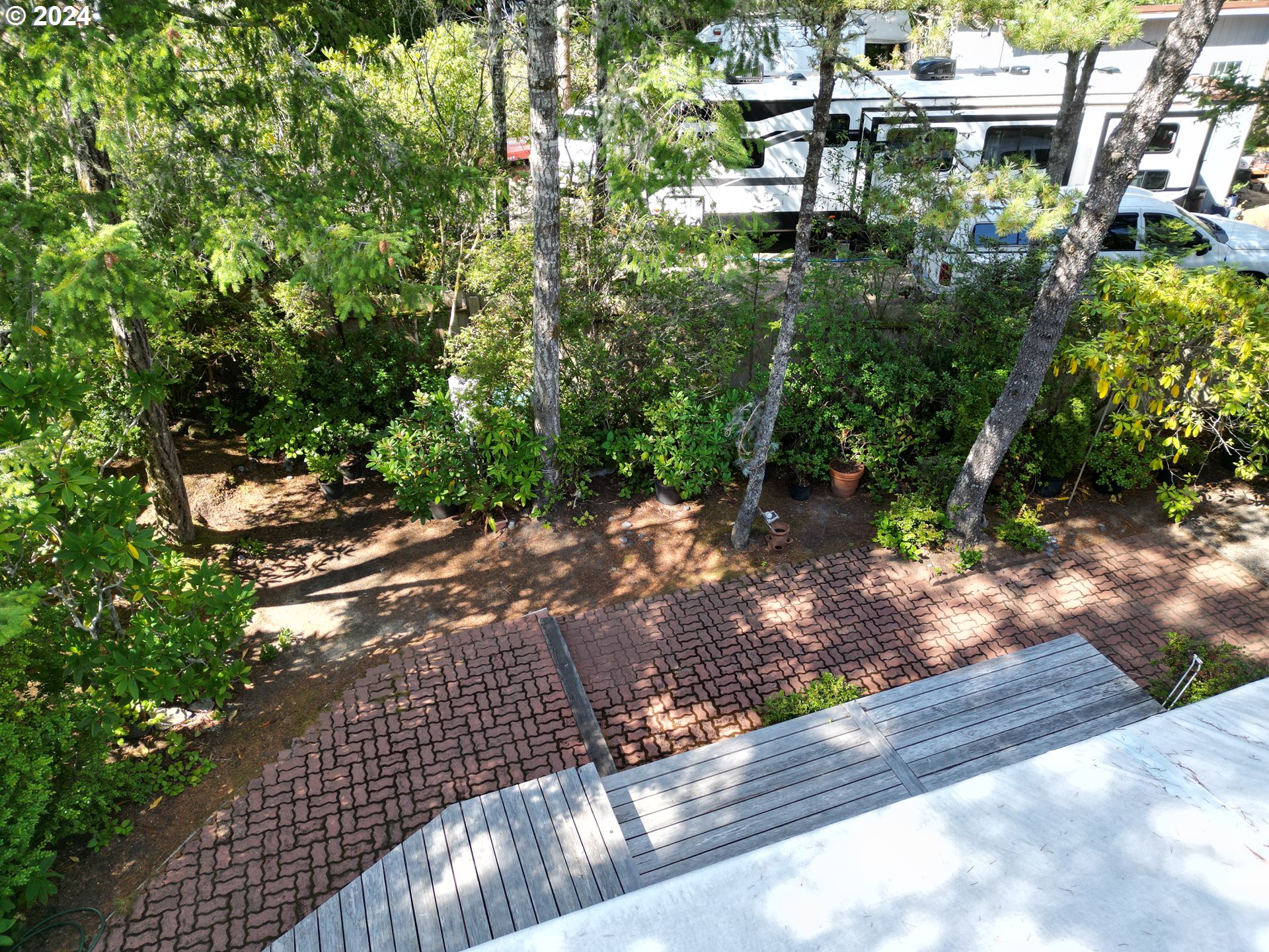 246 Horseshoe Bend Florence, OR 97439 - Photo 23 of 33 a view of a garden