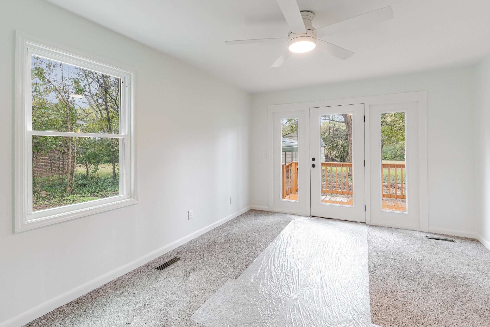 1307 Atlas Street Murfreesboro, TN 37130 - Photo 17 of 24 an empty room with windows and outdoor view