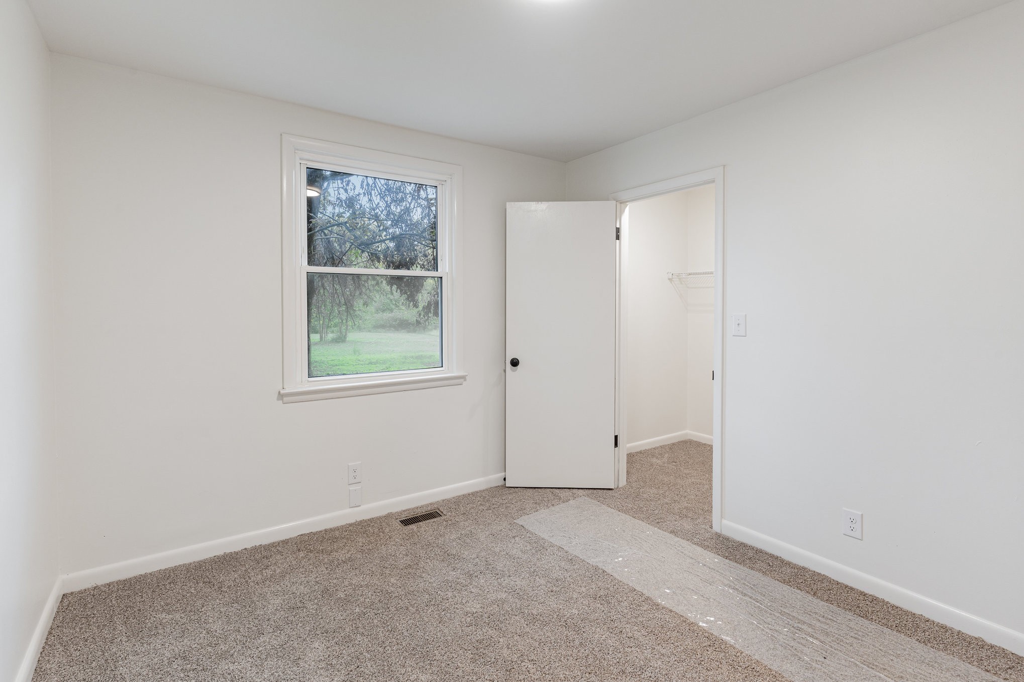 1307 Atlas Street Murfreesboro, TN 37130 - Photo 9 of 24 a view of an empty room with a window