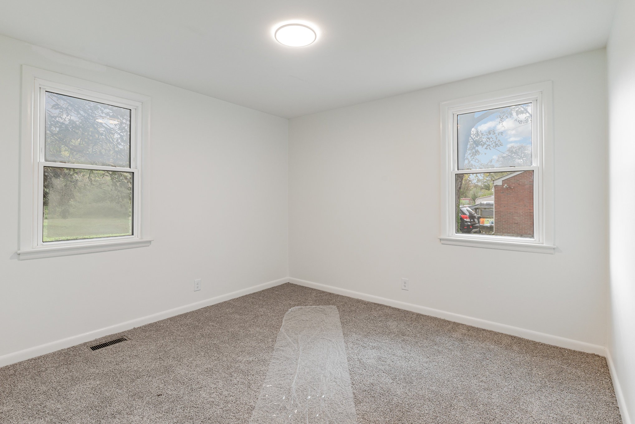 1307 Atlas Street Murfreesboro, TN 37130 - Photo 10 of 24 an empty room with windows