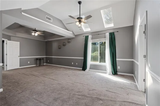 an aerial view of residential houses with outdoor space and swimming pool