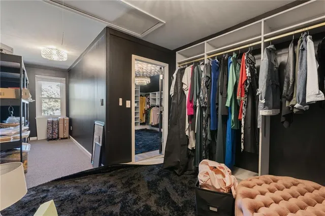 a view of a walk in closet