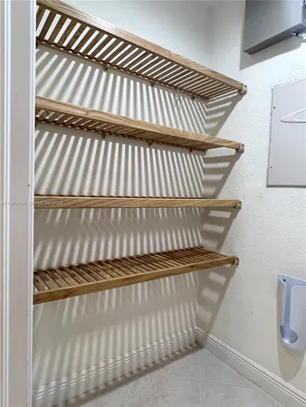 a bathroom with a double vanity sink mirror and