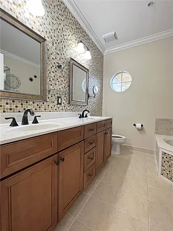 a bathroom with a sink and a bathtub