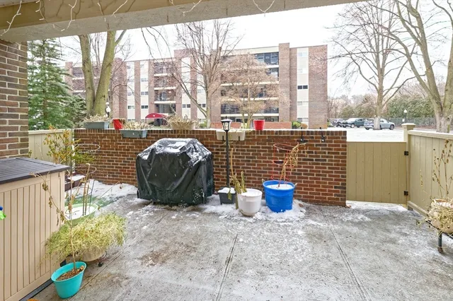 a view of a chairs and table in the patio